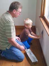 Painting with a young helper